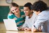 Photo of students doing an activity together in the classroom.