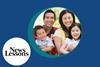 Asian family smiling at camera