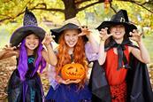 Photo of children dressed up for Halloween. If too hard, photo of Halloween costumes or decorations.