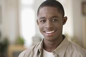 African American teenage boy smiling