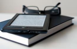 Photo of teaching materials (books, worksheets, laptop, etc.)