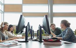 Photo of a class where students are doing a listening activity.