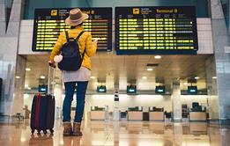 Photo of a girl getting ready to travel abroad.