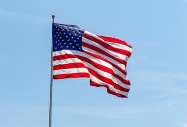 American flag waving on pole