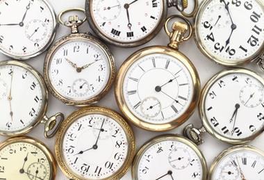 Bunch of pocket watches and clocks