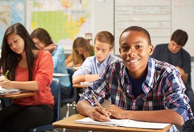 Photo of a class with students from different ethnic communities. Could be a photo of a classroom from South London, for example. If too hard, then a photo of a list of different languages.