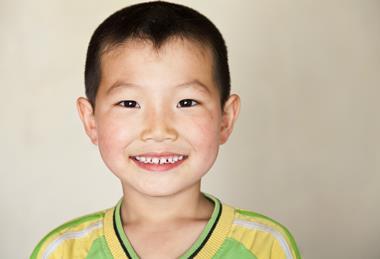 Asian boy smiling