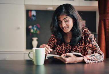 Teenage girl reading a book