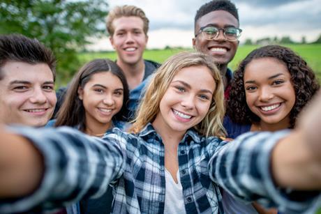 Teenagers smiling for selfie