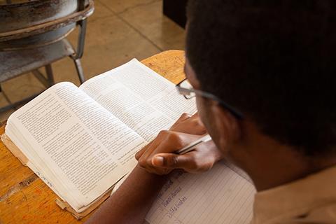 Photo of students reading.