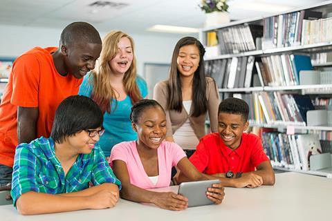 Photo of a classroom of teenagers.