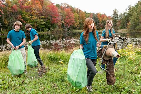 Phot of a group of teenage students working together.