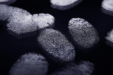 Photo of a teenager dressed as a detective or tools to suggest the idea of finding out who did what. If too complicated, photo of students asking each other questions.