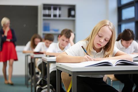 Photo of a student/s taking a written exam.