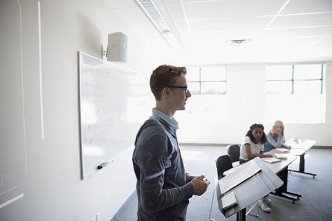 Photo of students giving a  presentation.