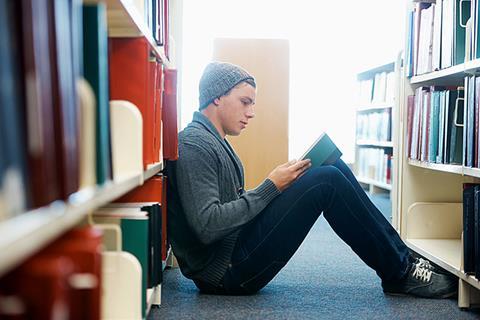 Photo of students studying (should be teenagers).