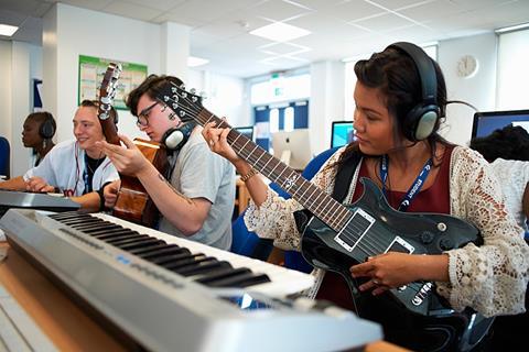 Photo of students practising something together or doing an activity together.