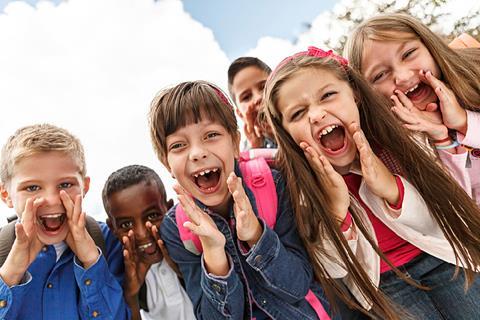 Photo of children from different countries, or photo of a world map.