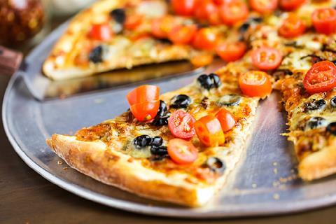 Photo of a pizza or photo of different dishes all on the same table.