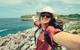 Young woman taking a selfie while on holiday